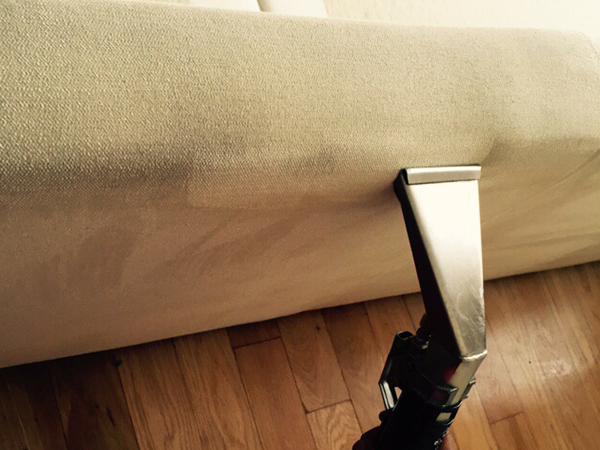 Extraction of Dirt and Moisture by Big Red's Upholstery Cleaning Experts